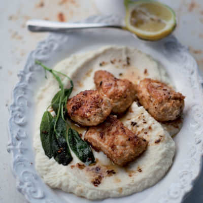 Silky cauliflower puree topped with crisp coconut chicken
