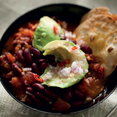 Spicy Mexican red kidney bean soup with chunky guacamole