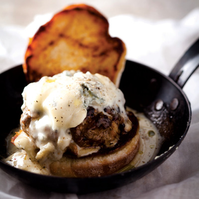 Beef burger with blue cheese sauce