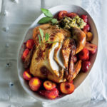 Buttery roast turkey with mushroom-and-sausage stuffing and roast plums
