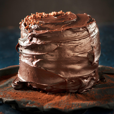 Moist chocolate cake with coconut ganache and white chocolate cream-cheese filling