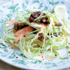 Baby cabbage slaw with dates tossed in a garlic-and-malt mayo