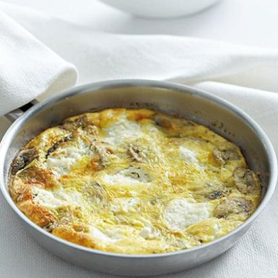 Baked mushroom and cheese omelette with sorrel salad