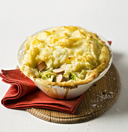 Baked sausage, cabbage and potato mash | Woolworths TASTE