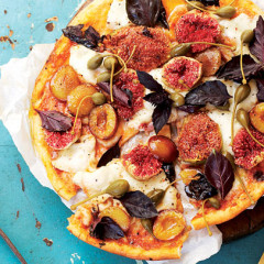 Fig and prune pizza with caper berries