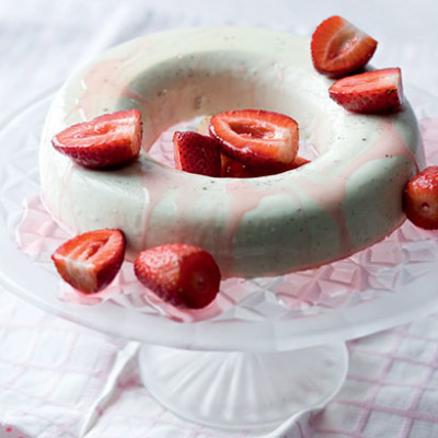 Buttermilk and vanilla panna cotta with syrupy strawberries