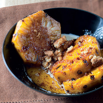 Buttery rum pineapple with crushed ginger biscuits