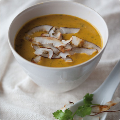 Curried butternut soup with crisp coconut shavings