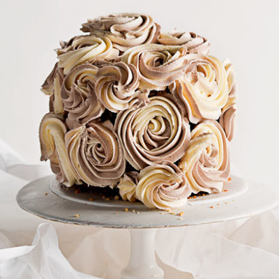 Dense white chocolate cake with buttercream roses