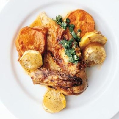 Flat-roasted organic chicken on sweet potatoes