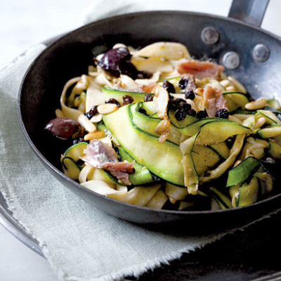 Fresh pasta tossed with baby marrow, anchovies and olives