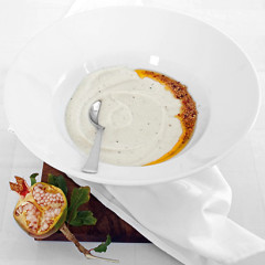 Garlicky creamed cauliflower soup with burnt mustard seed and chilli butter