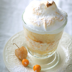 Gooseberry cream vanilla sponge trifle with singed meringue caps