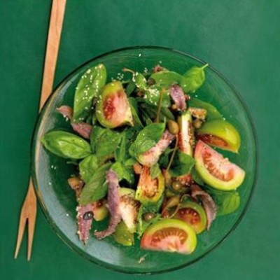 Green tomato salad with anchovy and sesame dressing