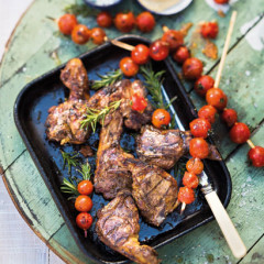 Harissa lamb chops with blistered tomatoes on skewers