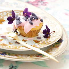 Lemon cupcakes with beetroot frosting and candied violets
