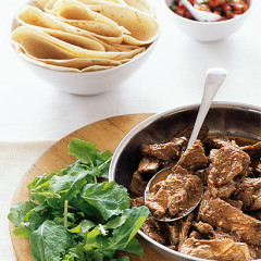 Mexican spiced beef strips with tortillas and salsa