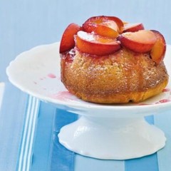 Moist steamed plum pudding with tart plum syrup