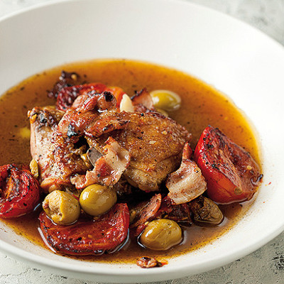 Oven-baked chicken with blistered tomato and bacon
