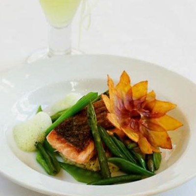 Pan-roasted norwegian salmon with lime spaetzle, fricassee of greens and spring-onion veloute