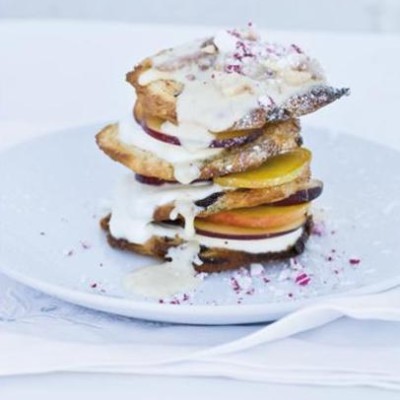 Panettone wafers layered with creamy yoghurt and fresh fruit, drizzled with nougat cream