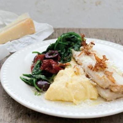 Panfried hake with polenta and wilted baby spinach