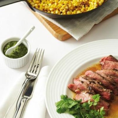 Pangrilled corn with sliced seared steak and fresh coriander sauce