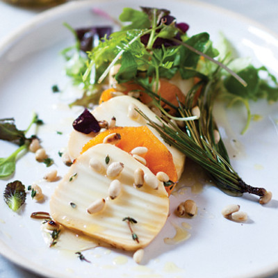 Persimmon and smoked mozzarella salad with pine nuts and pine-needle honey