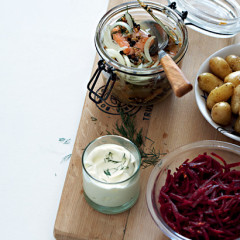 Pickled salmon trout with baby potatoes and hot beetroot salad