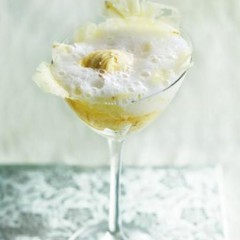 Pineapple carpaccio with champagne froth and mango sorbet