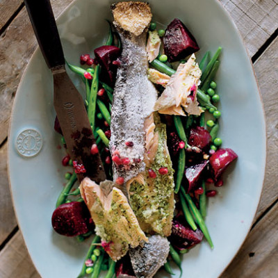 Pomegranate salt-roasted trout with balsamic beetroot and greens