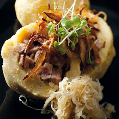 Potato dumplings with gammon and sauerkraut