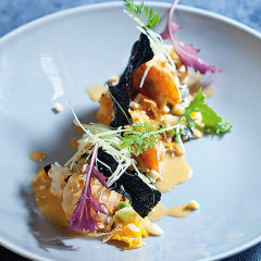 Prawns with butternut rice, red curry cream and seaweed crisps