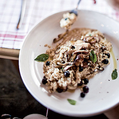 Risotto with blue berries and wild mushrooms