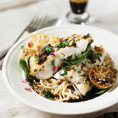 Roast fish with charred limes and sesame egg noodles