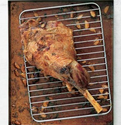 Roast leg of lamb with garlic sauce | Woolworths TASTE