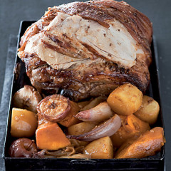 Roast pork with pumpkin and baby apples