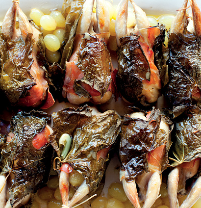 Roast quail wrapped in vine leaves with grapes and herbed orzo | Woolworths TASTE