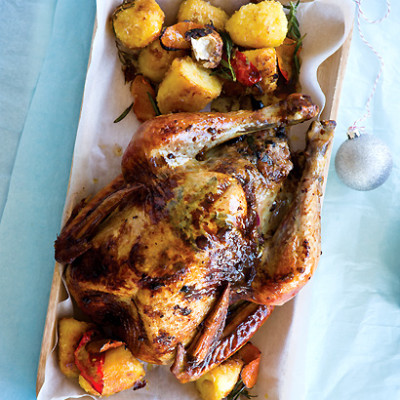 Roast turkey with pear stuffing and roast potatoes
