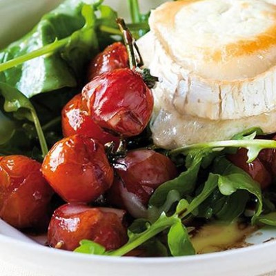 Roast vine tomatoes with oozing goat's-milk cheese