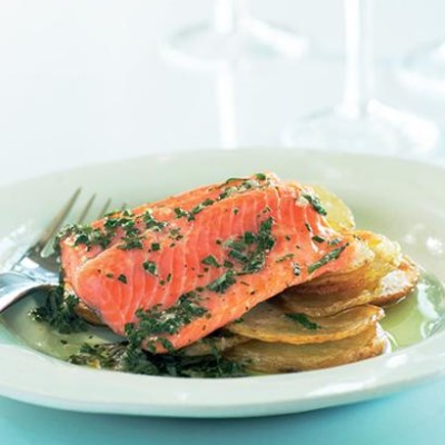 Roasted salmon trout and potatoes with herb dressing