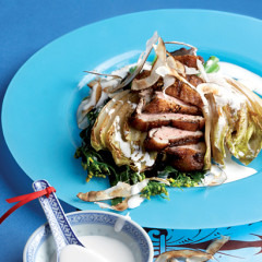 Seared five-spice duck with Asian greens and ginger and wasabi coconut cream