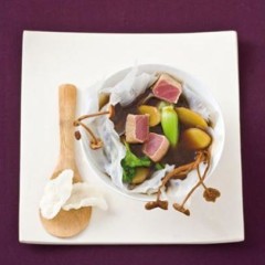 Seared tuna, ginger and dried mushroom broth in a starch sheet bowl