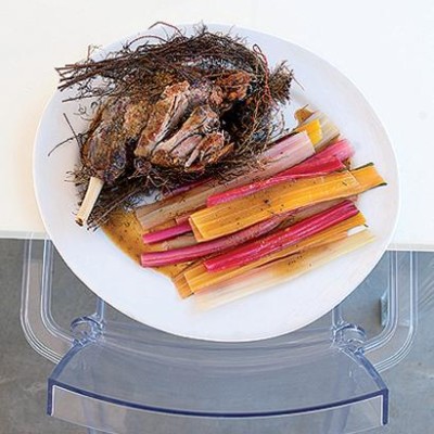 Slow-roasted leg of lamb in a nest of rosemary