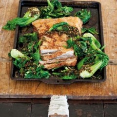 Slow-roasted pork belly with wilted bok choy, tatsoi and asian dressing