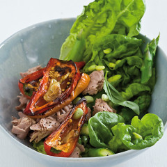 Spring tuna green salad served with garlicky blackened baby pepper