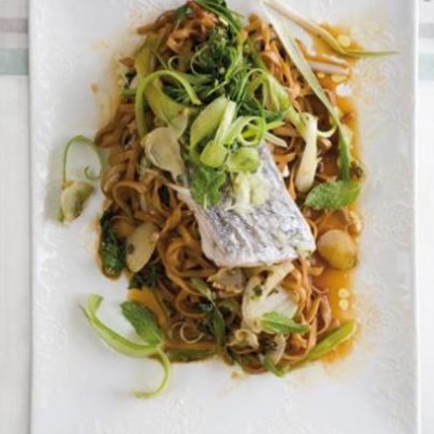 Steamed Asian fish on soy-dressed padthai noodles