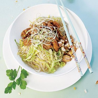 Stir-fried chicken and cashews with cabbage noodles