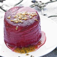Tart magenta swirl berry sorbet with fresh granadilla pulp