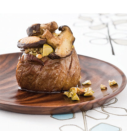 Tender fillet steak medallions topped with green-olive tapenade and shiitake mushrooms | Woolworths 